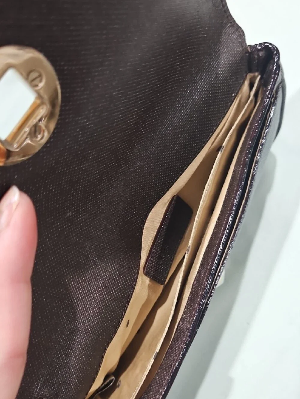 kate spade leather wristlet In Brown with gold hardware